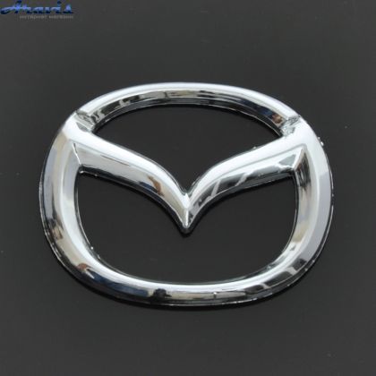 Емблема Mazda 626-323 пластик скотч хром нова 63х50мм