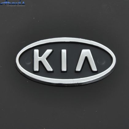 Емблема KIA Sepia Rio 96-2001 пластик скотч чорна 90х45мм